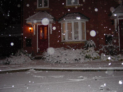 Our front door as viewed through the falling snow (Jan 2003).