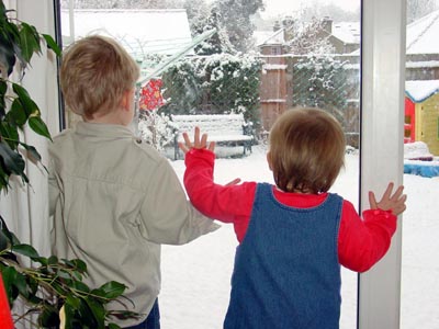 Joshua and Misha staring out at the snow