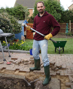 Stef sorting out the paving on the patio