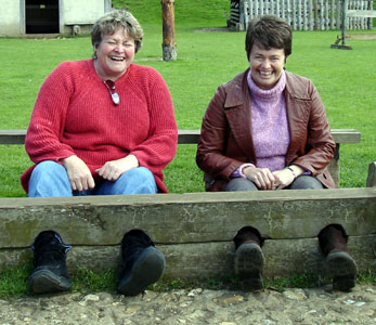 Linda and Merryl in the stocks at Mountfitchet castle
