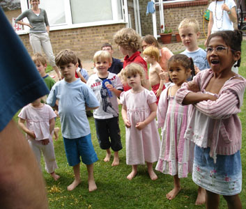 Stef entertains the children at the combined birthday party
