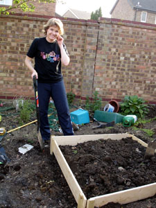 Mandy worting out the raised beds in the Veggie garden