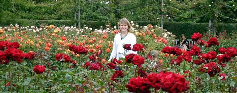 Mandy amongst the roses at Regents Park in London