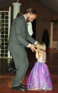 Misha having a dance with Stef at the reception