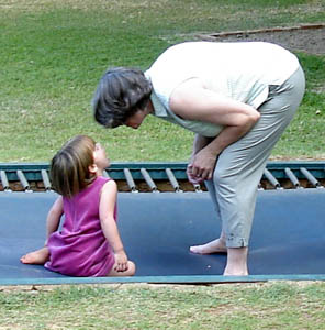 Misha on the trampoline with Grandma