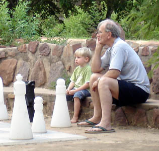 Grandpa stumped as he considers his next move