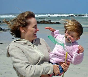 Mandy & Misha enjoy a fun moment on the beach