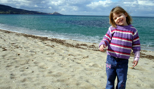 Misha happy to be at the beach again