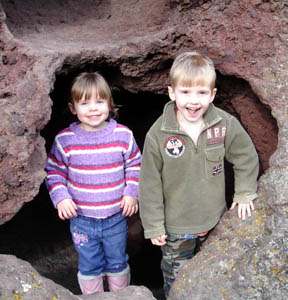 Joshua & Misha explore the natural tunnels inside Elephant Rock.  Joshua found some pumice there.