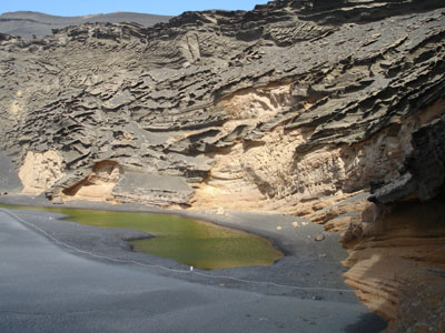 El Golfo - a crater filled with sea water.  The green colour is due to algae in the warm water.