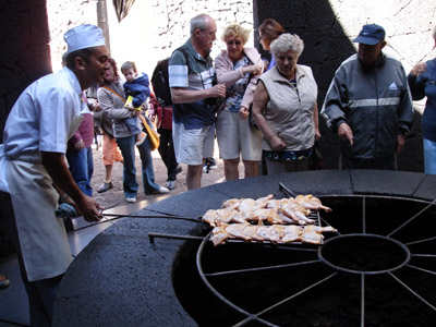 A hole in the ground is used as an oven to cook all the meat and fish served at the restaurant on Mt Timanfaya