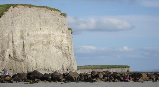 Sheer cliffs next to the beach at Silverstrand