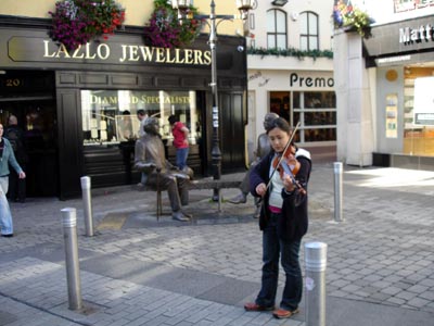 A street musician - a common site in Galway city center