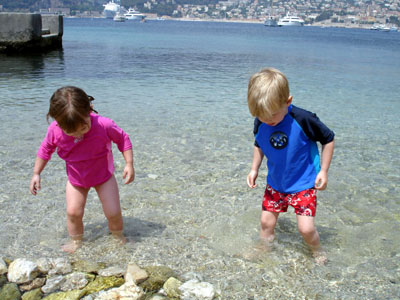 Joshua & Misha looking for sparkly stones at La Plage Passable