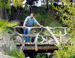 Joshua with Stef on a cute little bridge in a play park