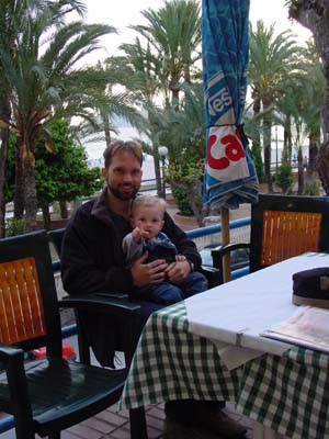 Joshua and Stefan at a restaurant near the beach