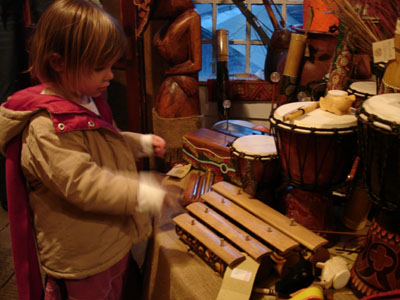 Misha trying her hand at some percussion instruments